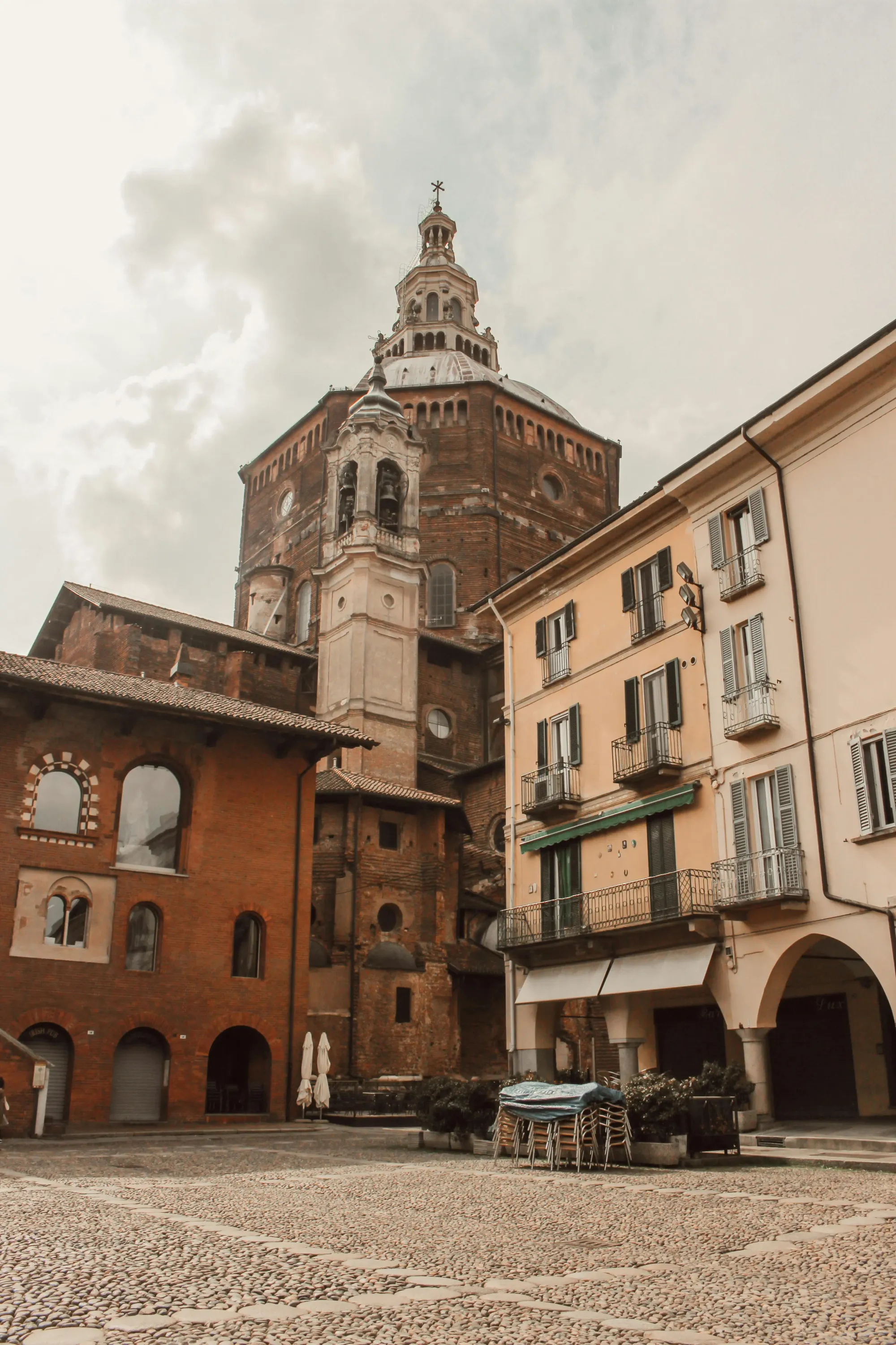 The dome of Pavia Cathedral rising above Piazza della Vittoria