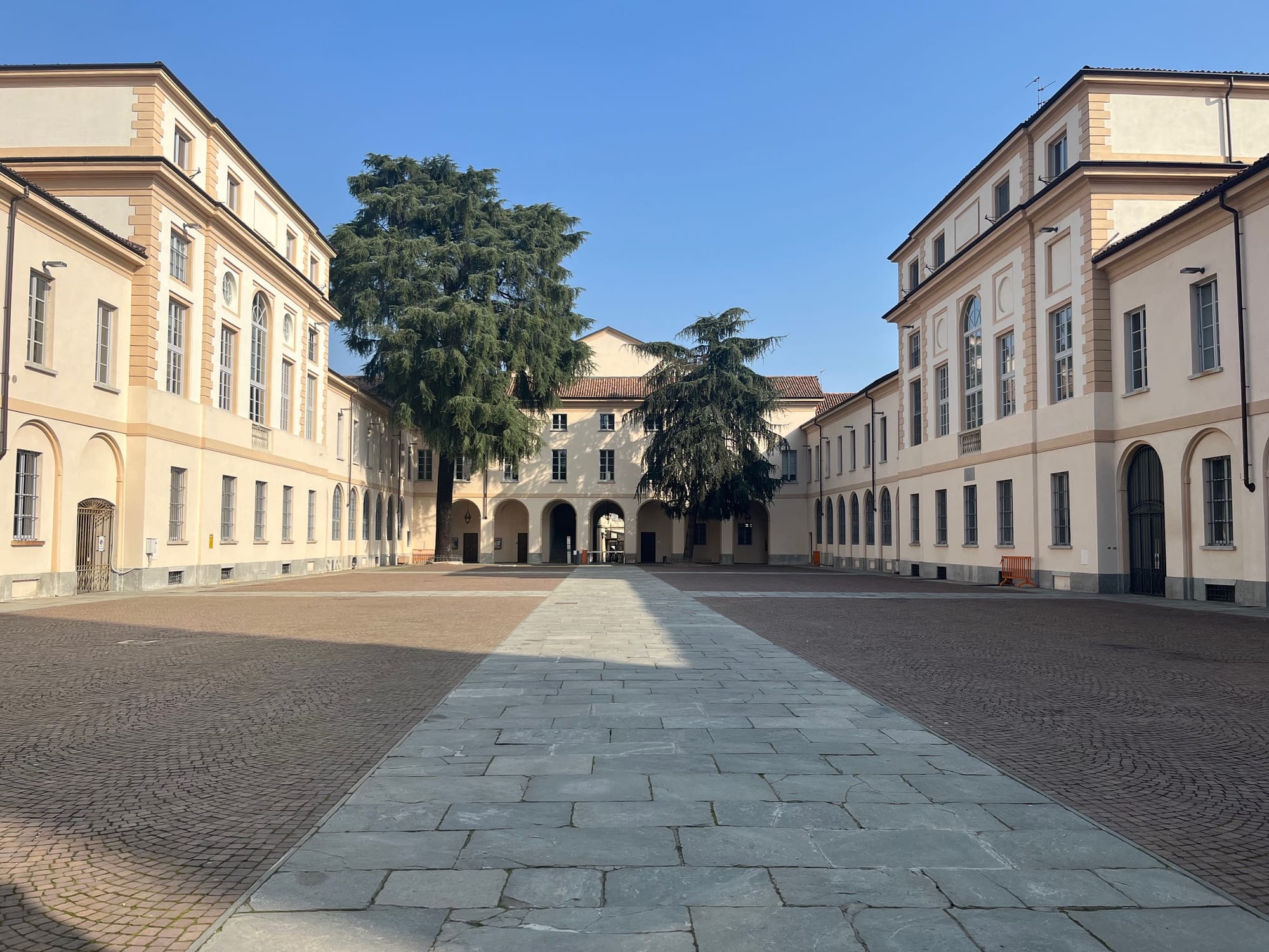 Courtyard and arcaded walkways of the University of Pavia, Italy
