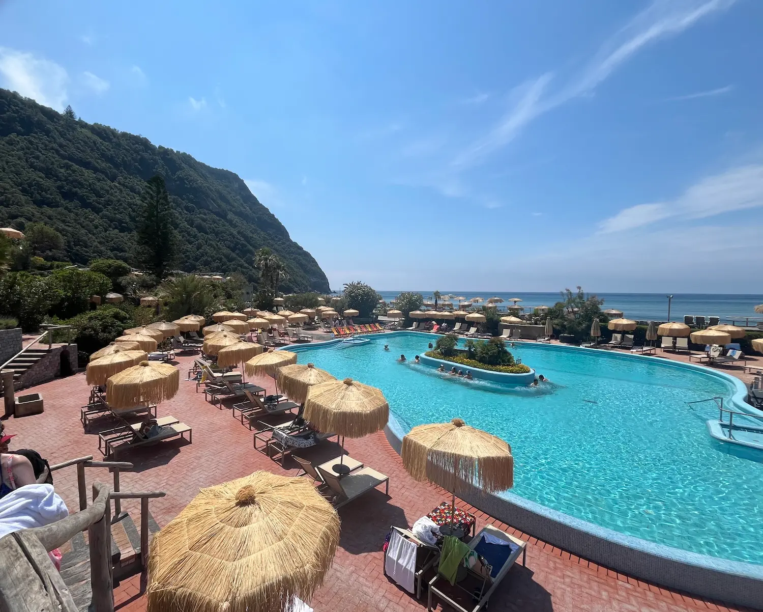 Poseidon Terme thermal pools at Forio, Ischia — pools set into volcanic rock above the sea with views over the Mediterranean