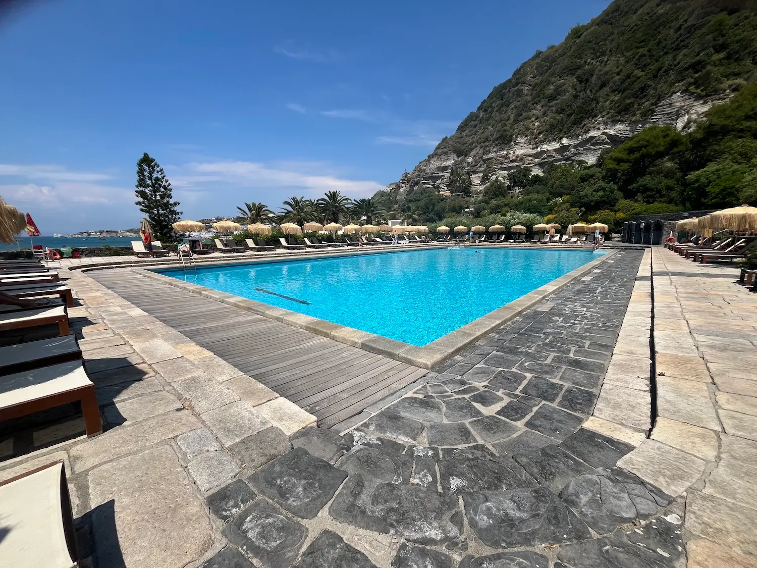 Poseidon Terme gardens and thermal pools, Forio, Ischia — the volcanic rock setting and sea views that make this one of Italy's finest thermal experiences