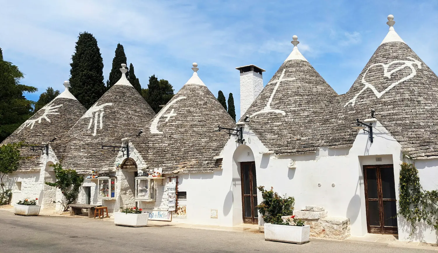 The trulli houses with painted symbols