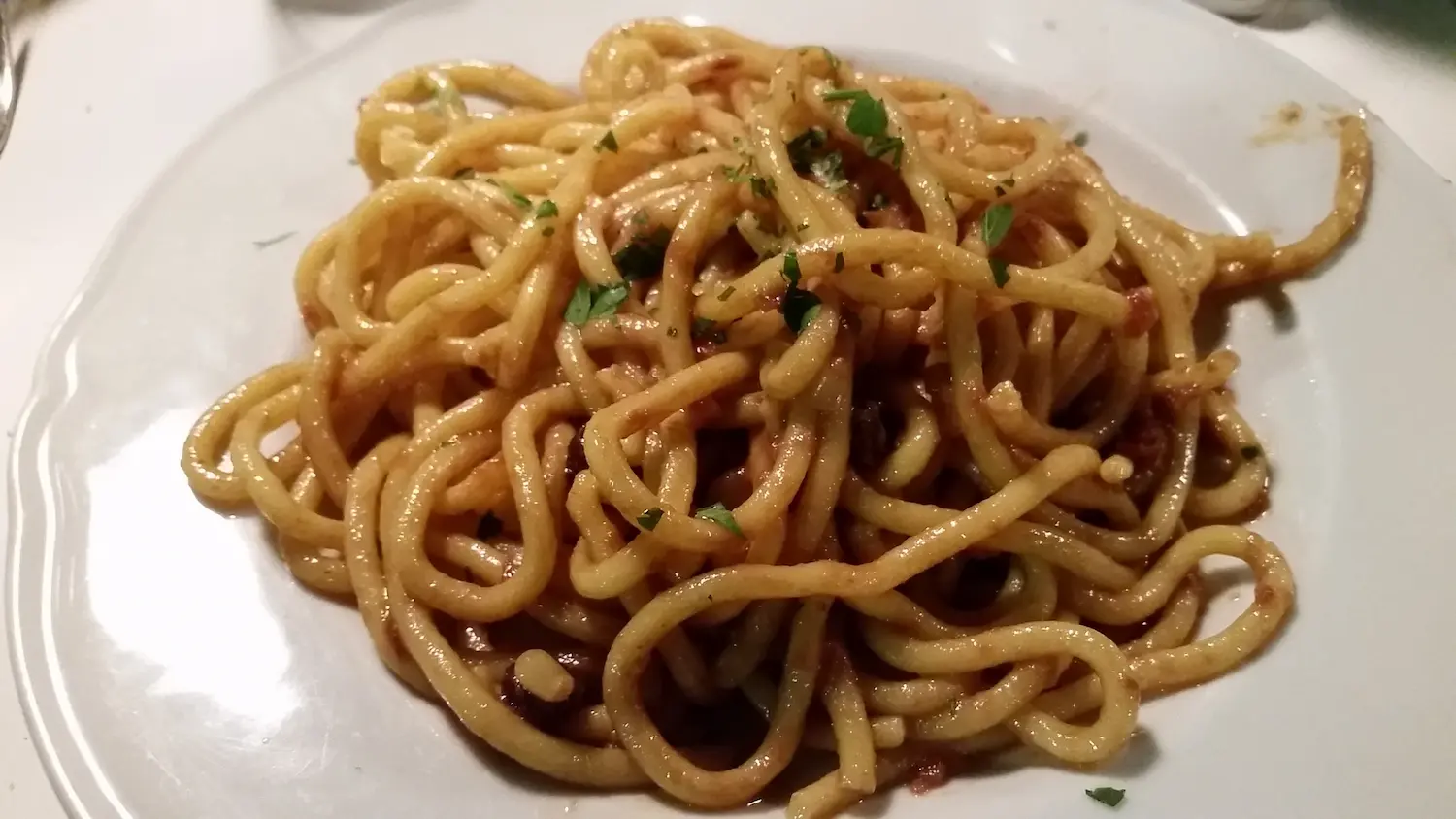 Bigoli pasta with anchovies and onion (Bigoli in Salsa)