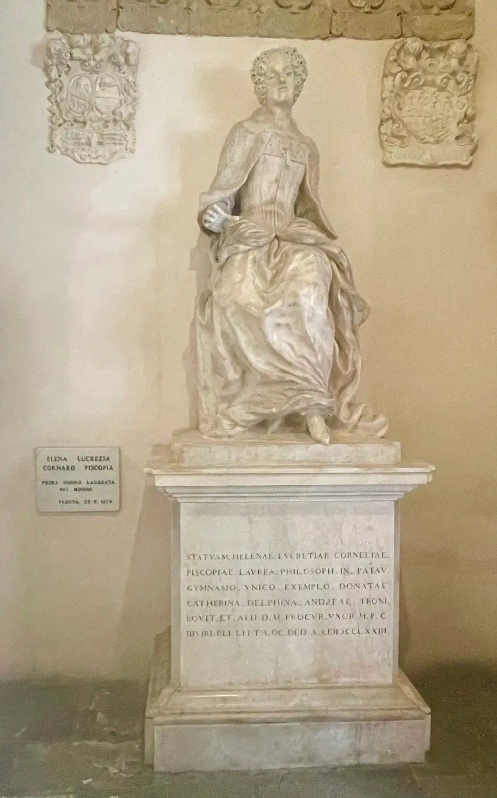 A statue of Elena Cornaro Piscopia, the first woman in Europe to earn a degree, in 1678